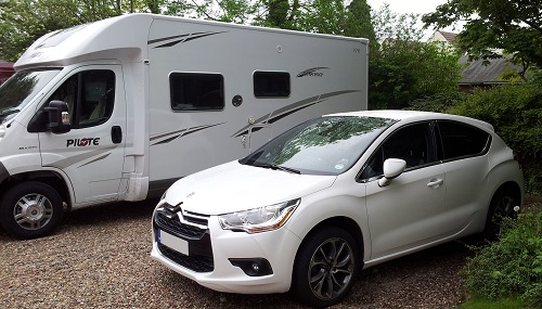 Curvy lines of DS4 contrast with box-like motorhome